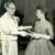National Officer  Mrs. W.C. Roberts presents Merle Stokes with initiation certificate. 
