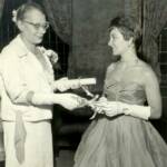 National Officer, Mrs. W.C. Roberts, presents Merle Stokes with initiation certificate.
